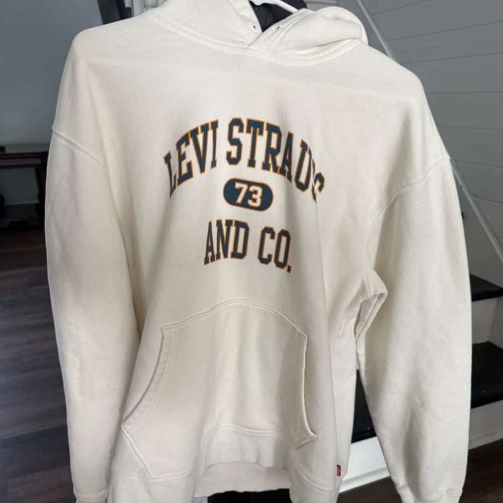 Levi's Cream Crewneck with Navy and Gold Varsity Logo